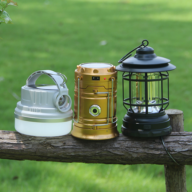 Black retro camping lantern, rechargeable LED, front view on white background